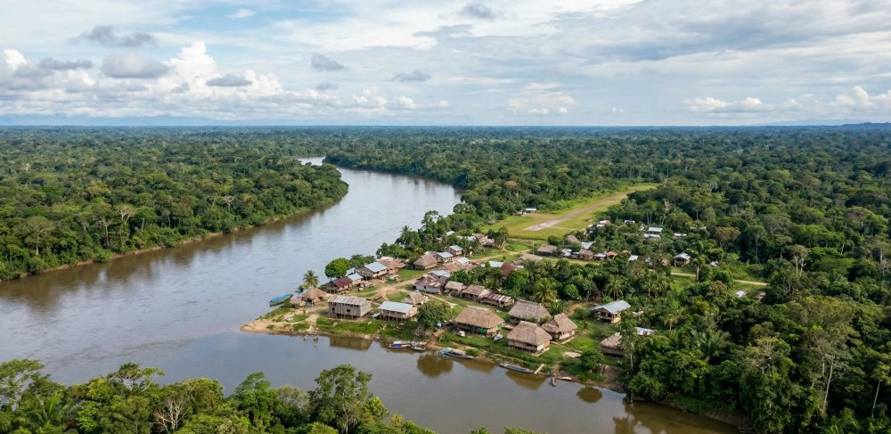 Boat navigation on Alto Madre de Dios River to Manu jungle lodge